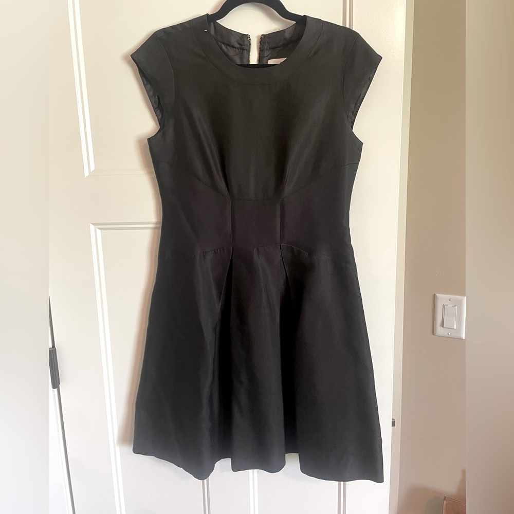 Adorable dress in great condition. Does need to be cleaned.